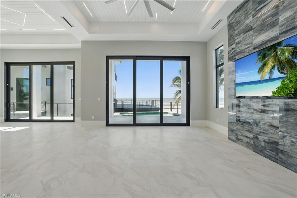 unfurnished living room and ocean viewVirtually Enhanced