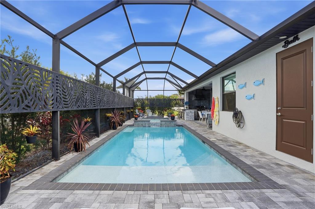 Integrated pool with self/ spa with a lanai