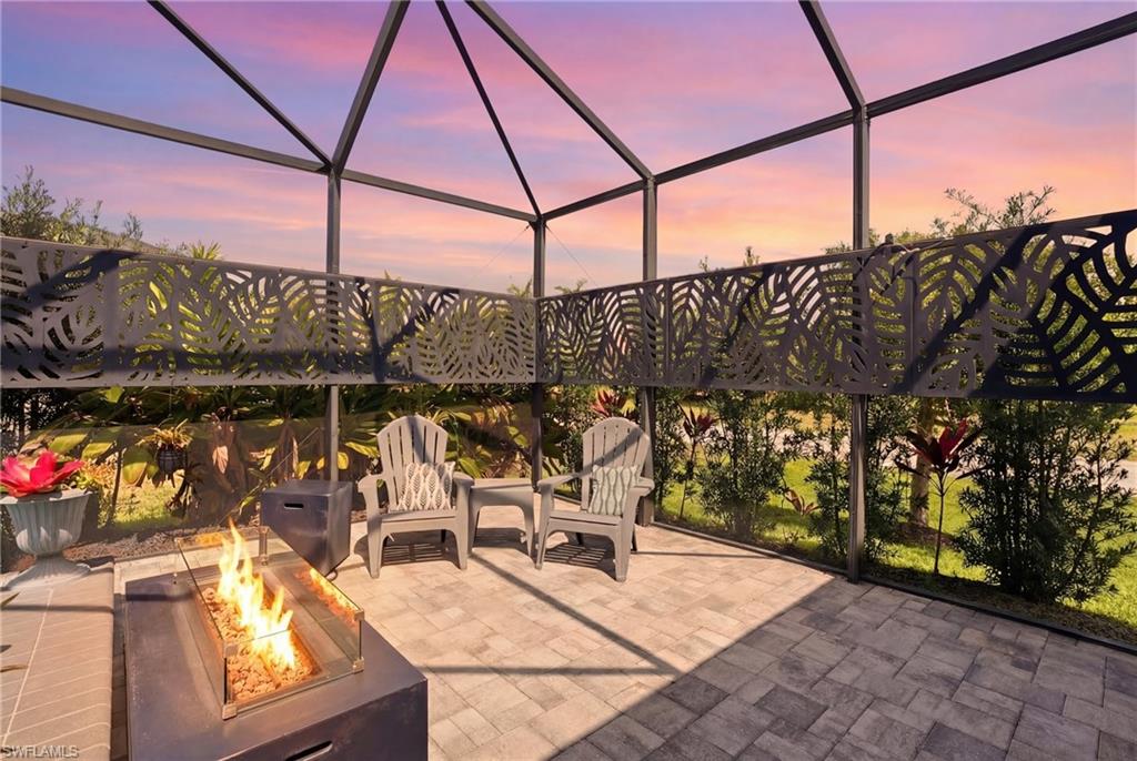 Patio terrace at dusk with a fire pit