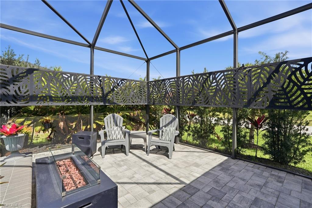 View of patio with a fire pit