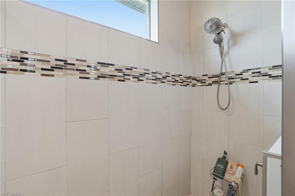 Bathroom with tiled shower