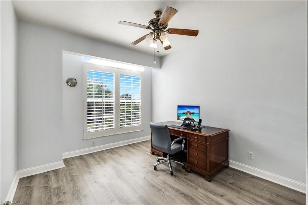 Office featuring ceiling fan and light wood-type flooring