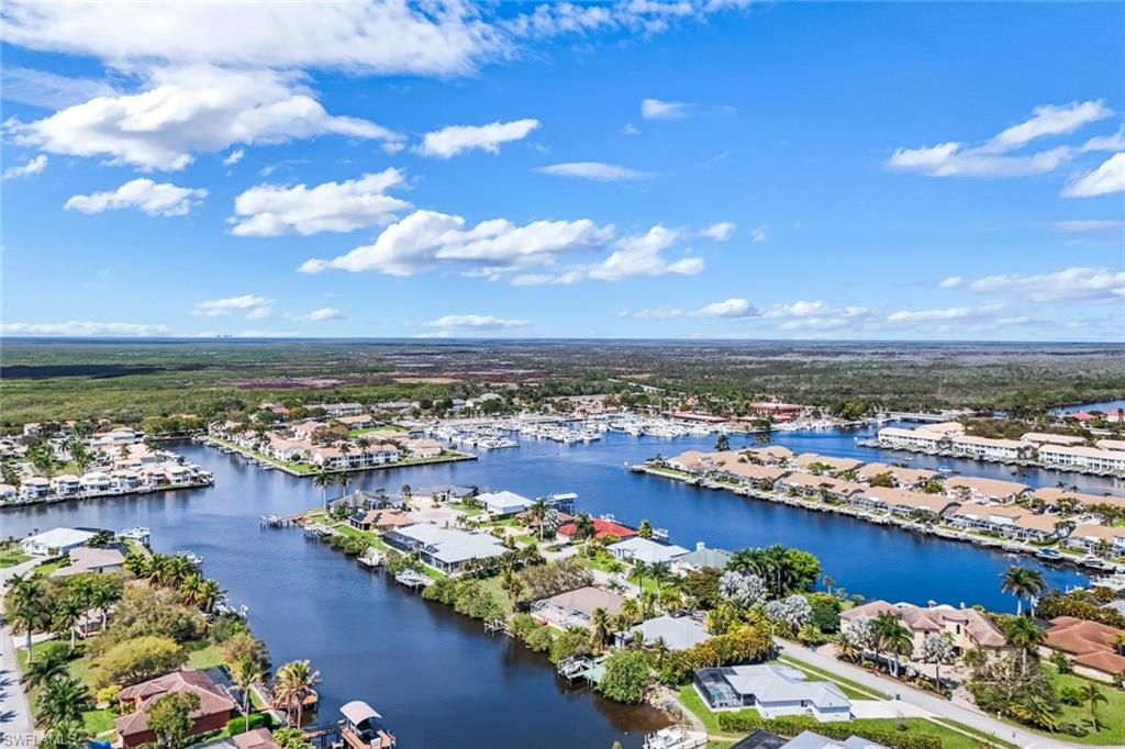 Aerial view of residential area with a large body of water