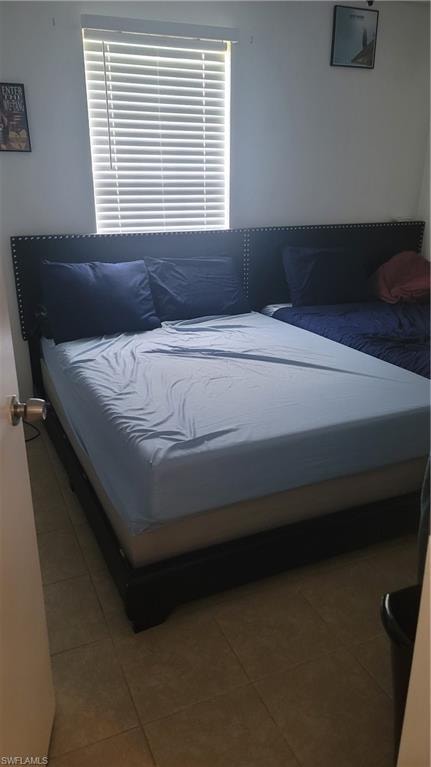 View of tiled bedroom