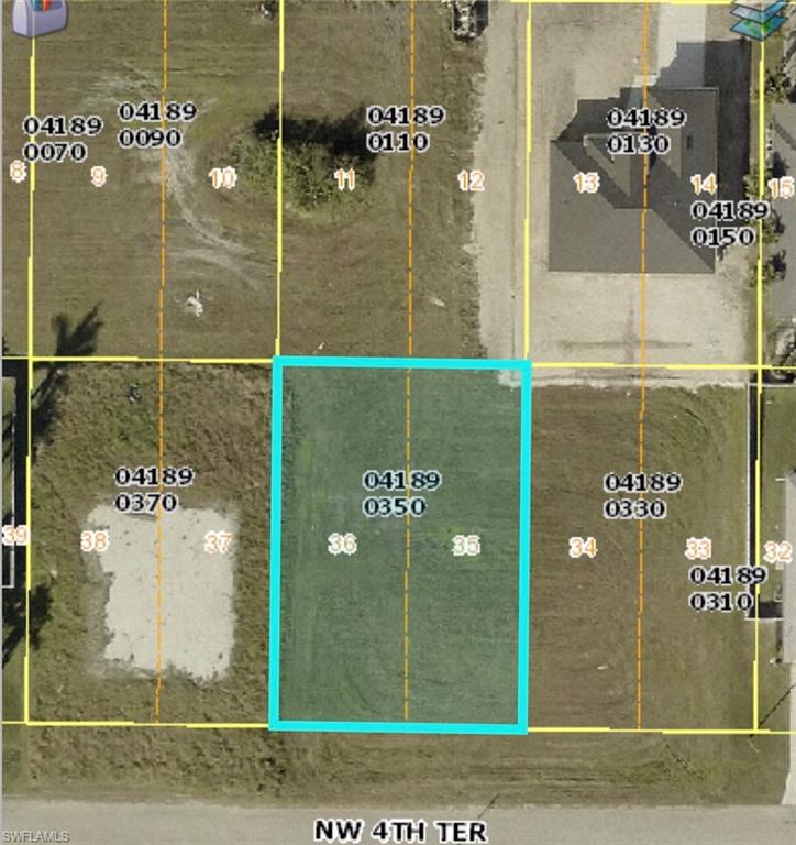 Aerial map of property and surrounding area with property boundaries highlighted