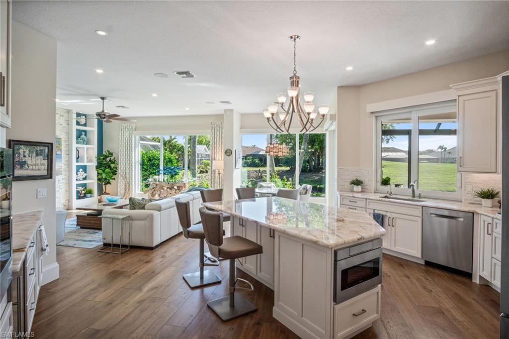 NEW MODERN CONCRETE TILE ROOF (2018), NEW HVAC SYSTEM (2021), HURRICANE-IMPACT WINDOWS AND DOORS