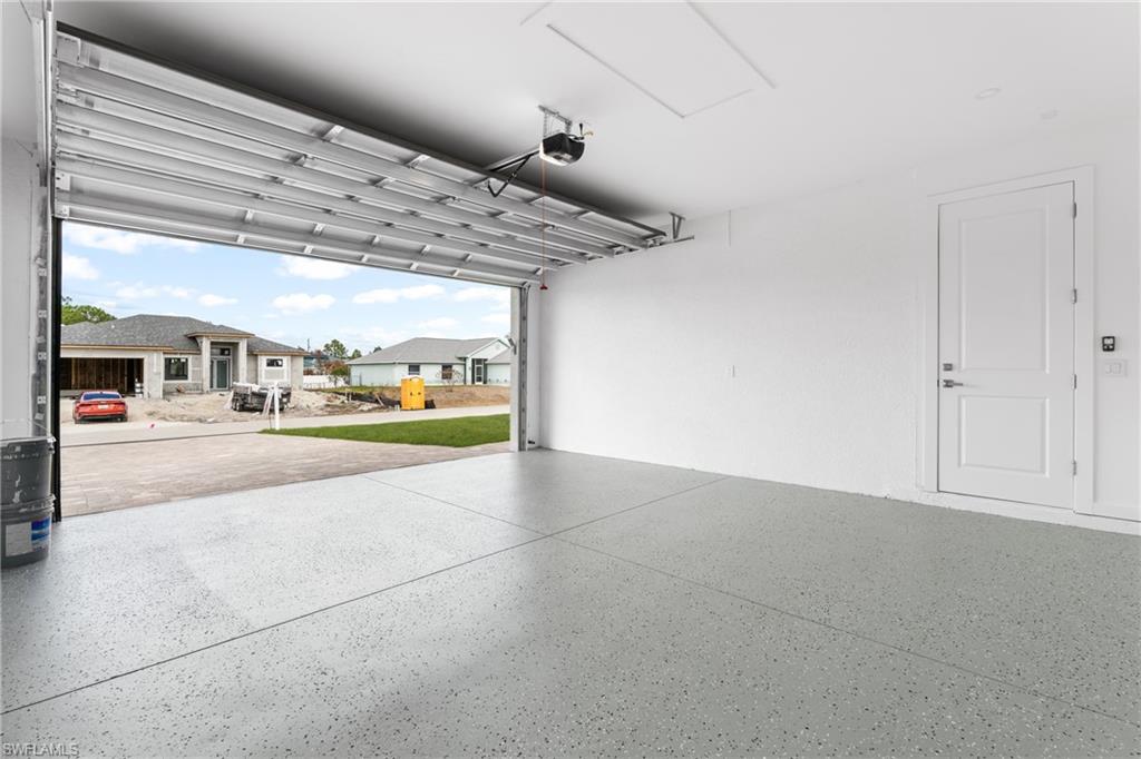 Garage featuring a residential view
