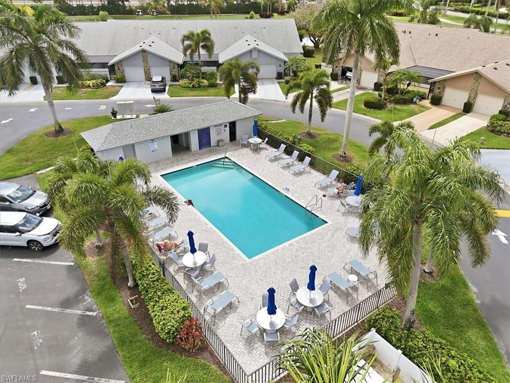 Community pool with a patio