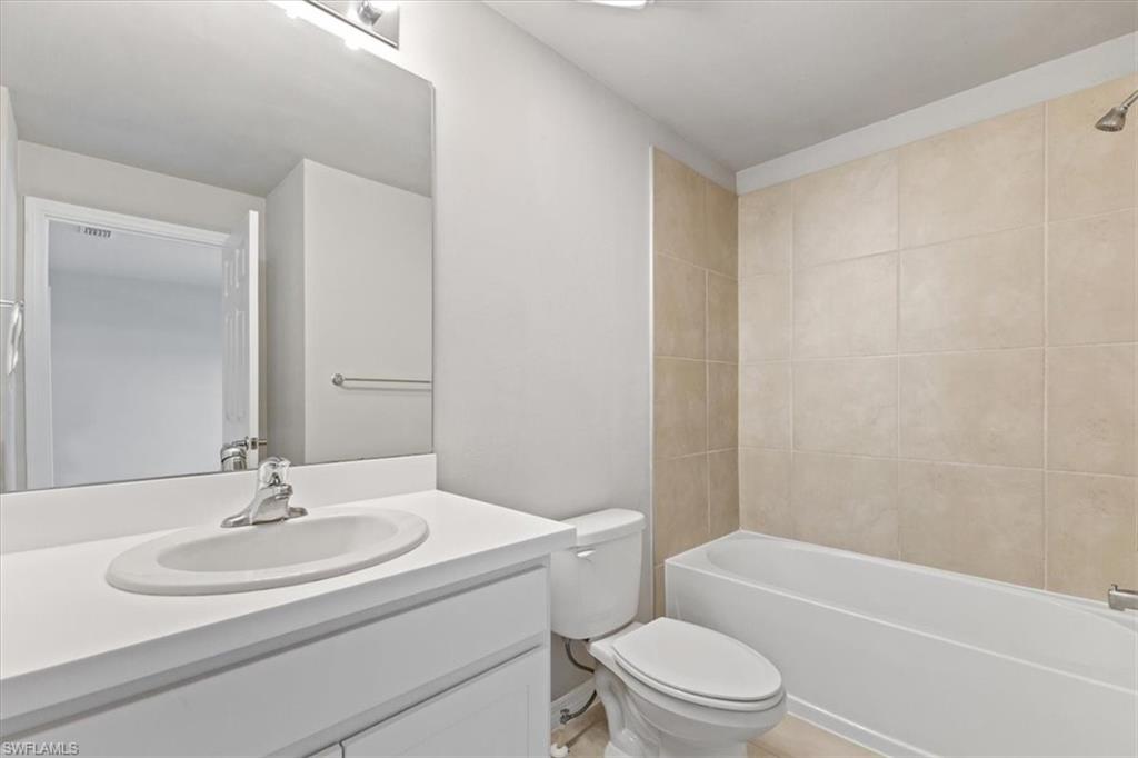 Full bathroom featuring vanity and shower / bath combination