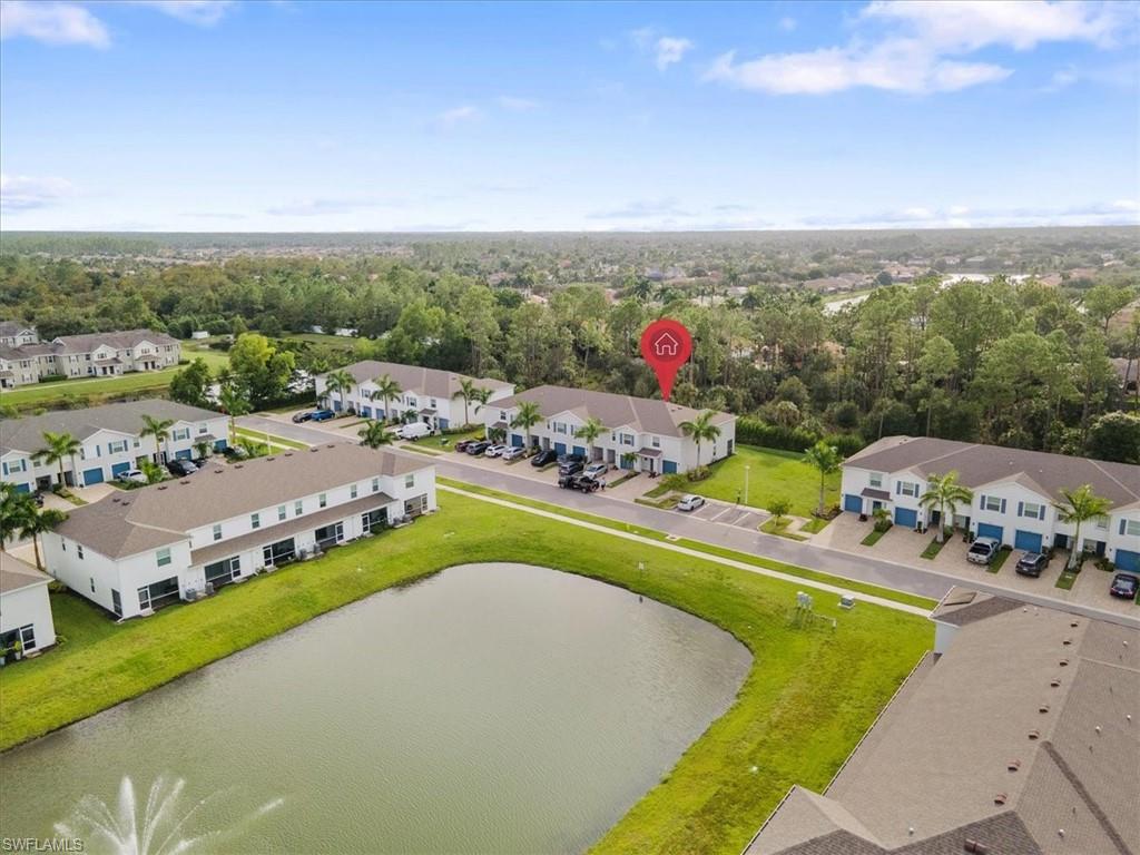 Aerial view of residential area with a nearby body of water