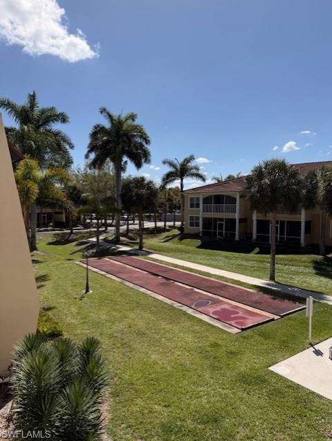 Surrounding community featuring a game area and shuffleboard