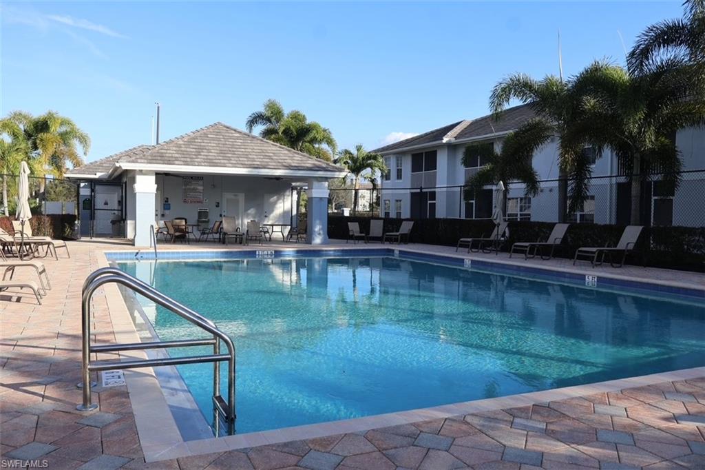 Community pool with a patio area
