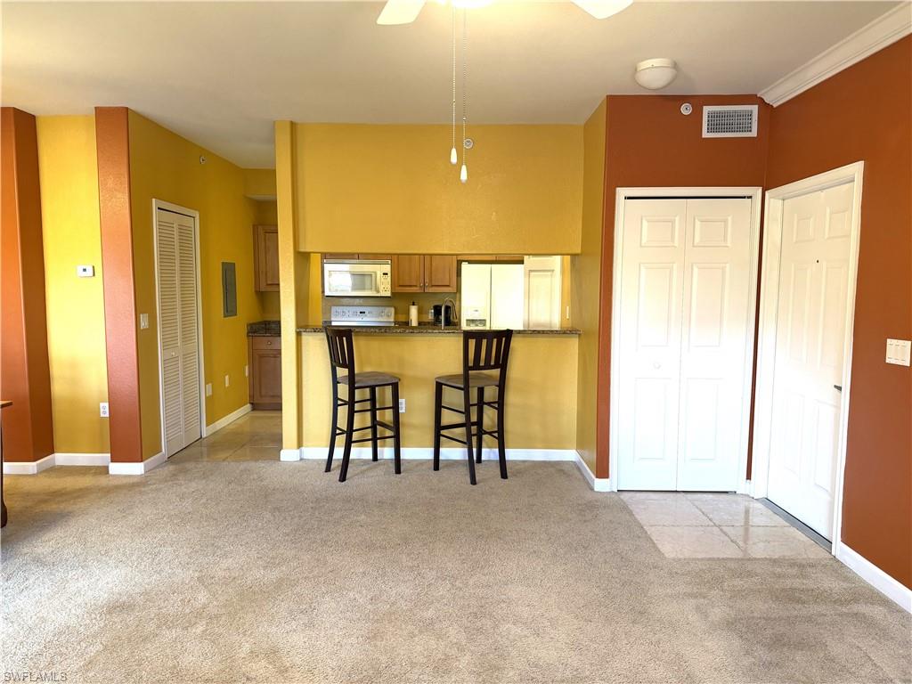 Front entry, carpet, and coat closet