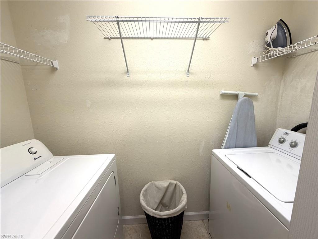 Full-size washer and dryer with shelving
