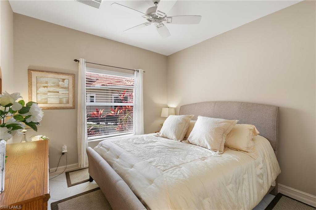 Bedroom featuring baseboards and a ceiling fan