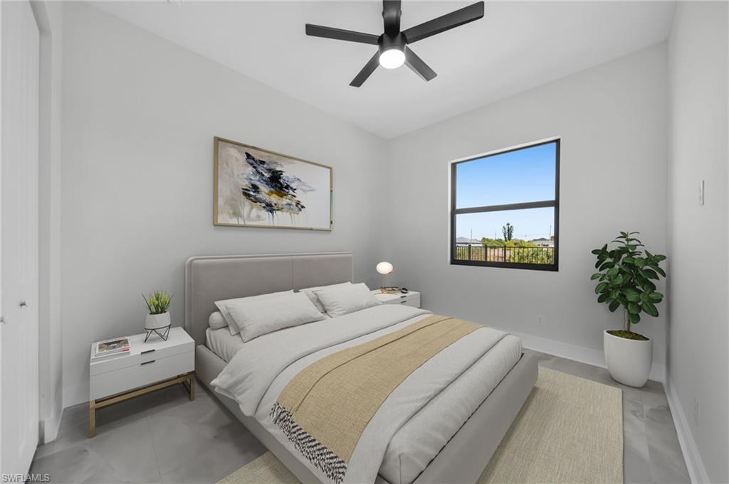 Bedroom with baseboards and a ceiling fan