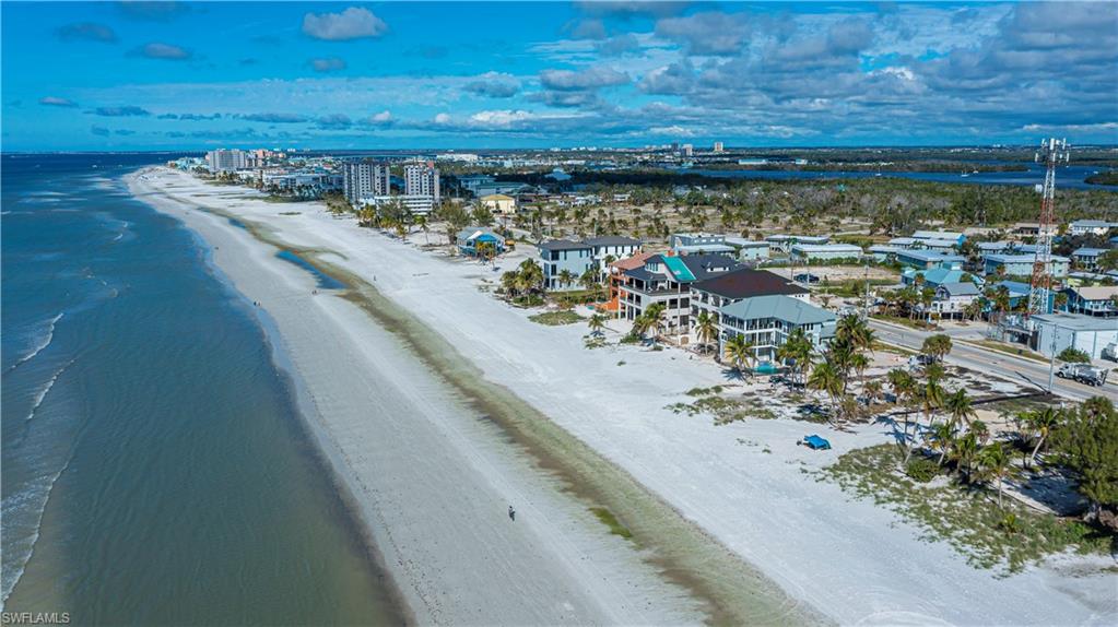 Bird's eye view of waterfront with a beach