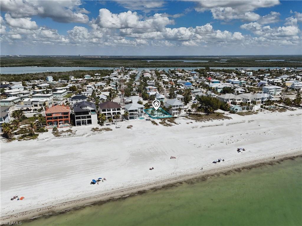 Aerial view of residential area with a nearby body of water