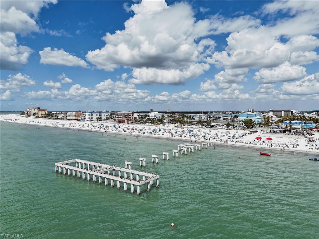 Water view featuring nearby urban area and nearby beach