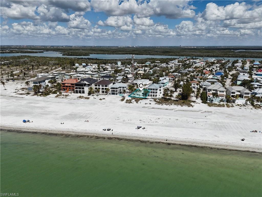 Aerial view of residential area with a large body of water