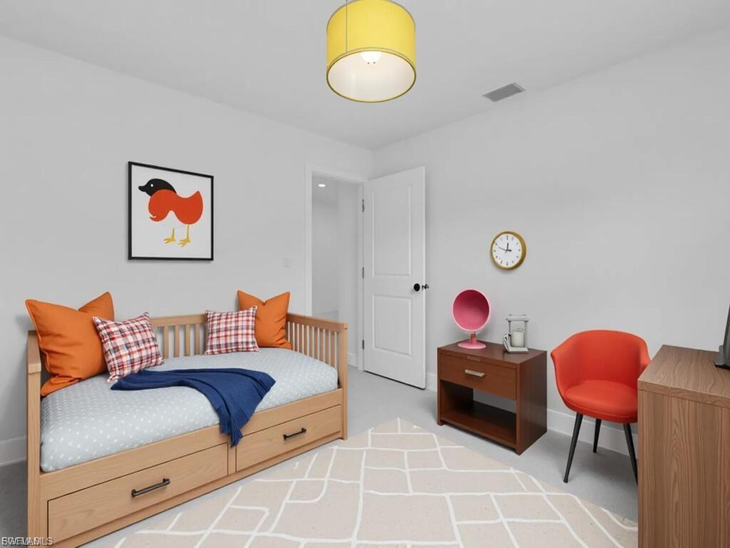 Bedroom featuring baseboards