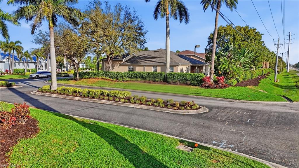View of asphalt road featuring curbs - Virtually Edited Image