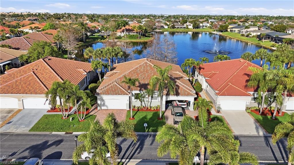 Aerial perspective of suburban area with a large body of water - Virtually Edited Image