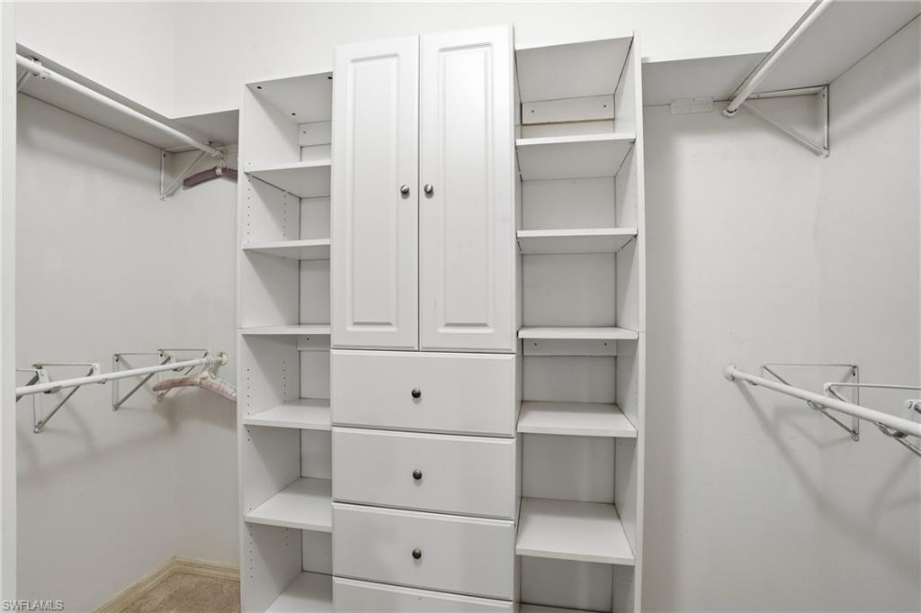 View of walk in closet - Virtually Edited Image