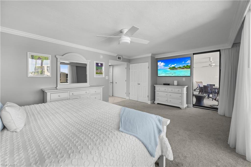 Primary bedroom with view to lanai.