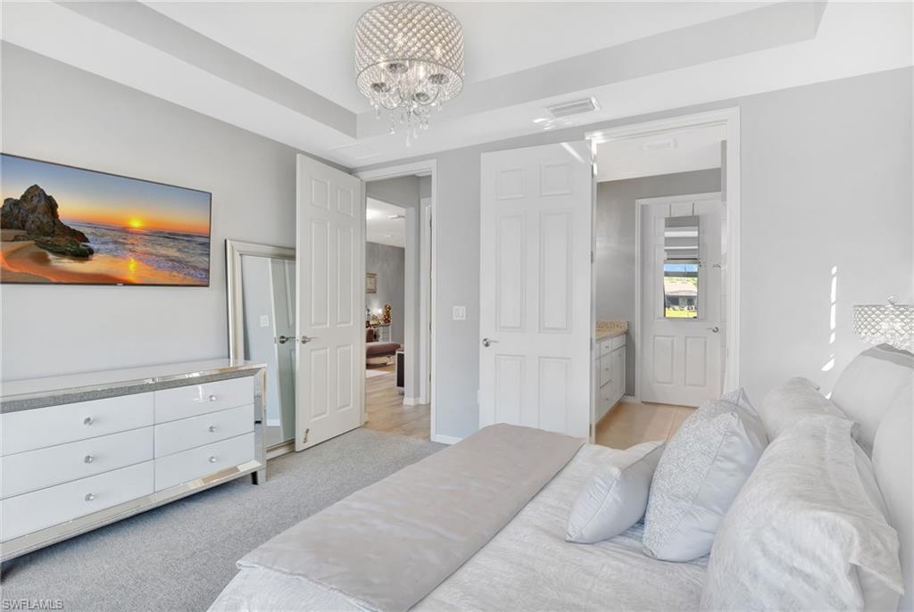 Primary bedroom with queen sized bed