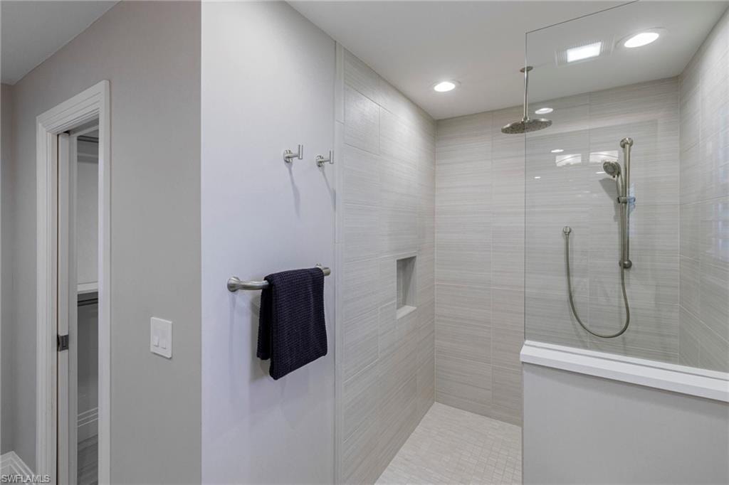 Bathroom with tiled shower