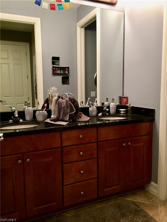Double vanity with large rain shower