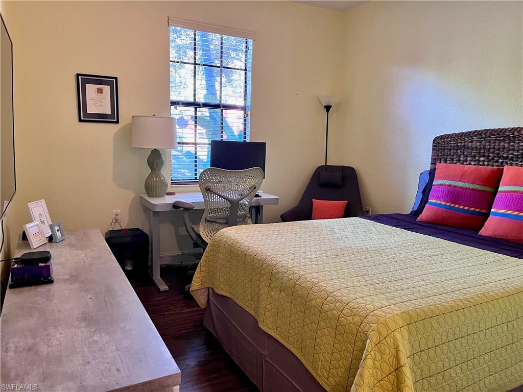 Third Bedroom with office area, queen bed and TV