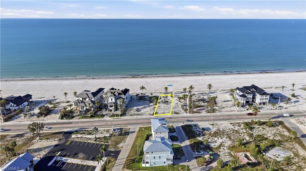 Aerial view of residential area featuring unending shoreline - Virtually Edited Image
