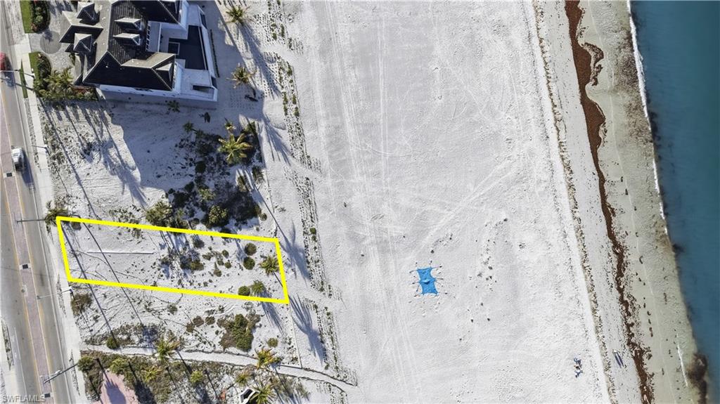 Aerial view of property's location with property parcel outlined - Virtually Edited Image