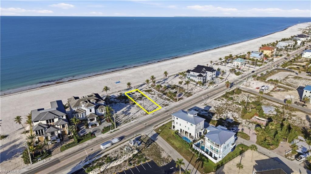 Aerial view of residential area with expansive coastline - Virtually Edited Image
