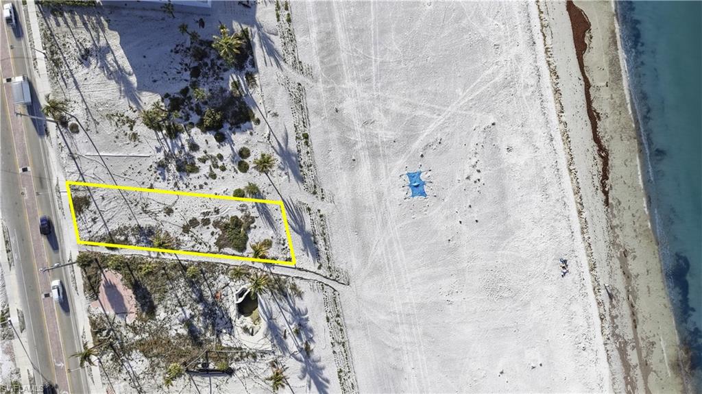 Aerial view of property and surrounding area with property boundaries highlighted - Virtually Edited Image
