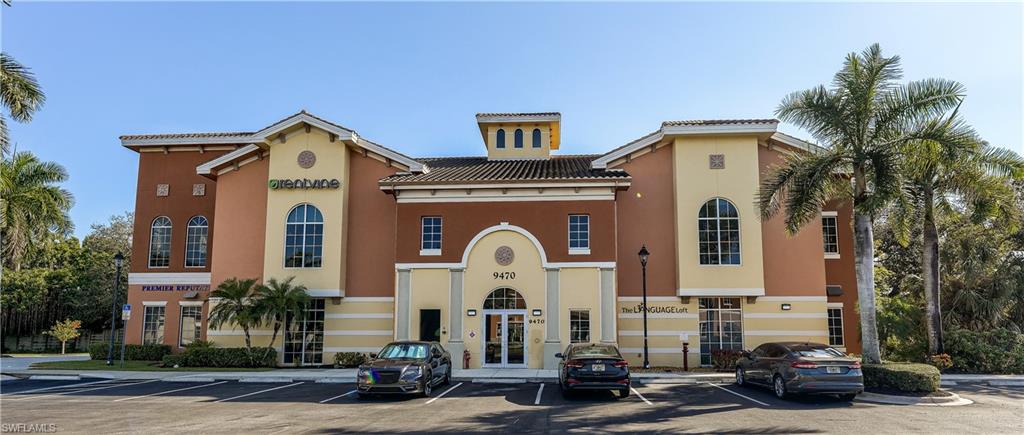View of commercial location with uncovered parking