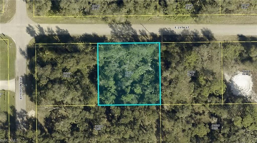 Aerial view of property's location featuring property parcel outlined