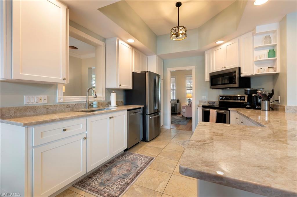 28100 Cetation Way Bonita Springs fL 34135 - Gourmet kitchen with shaker style cabinets