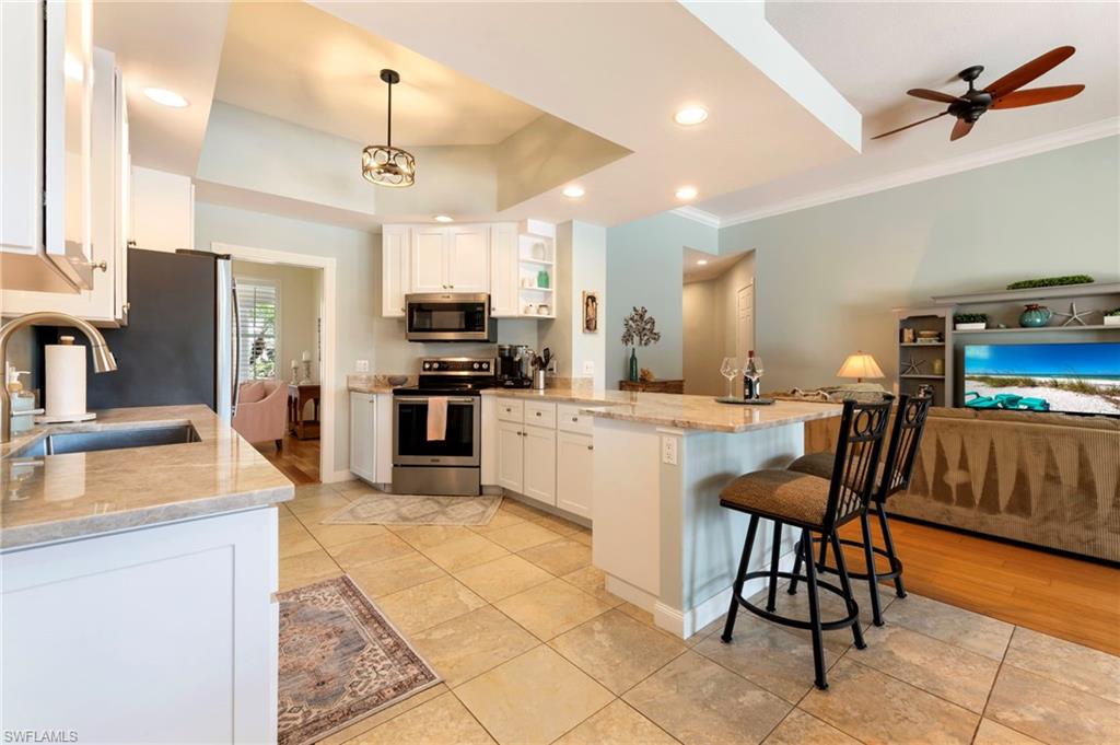 28100 Cetation Way Bonita Springs fL 34135 - Open kitchen with updated countertops and recessed lighting