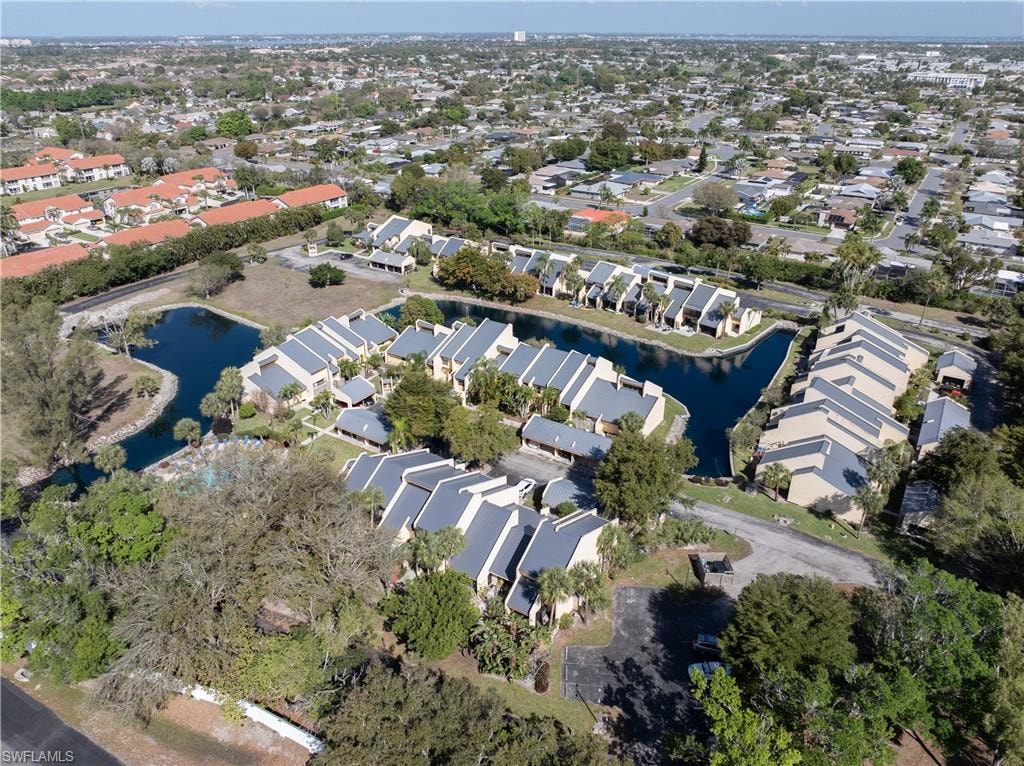 Aerial view of property's location featuring a nearby body of water