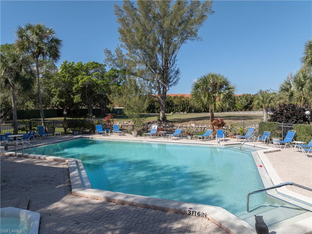 Community pool featuring a patio area
