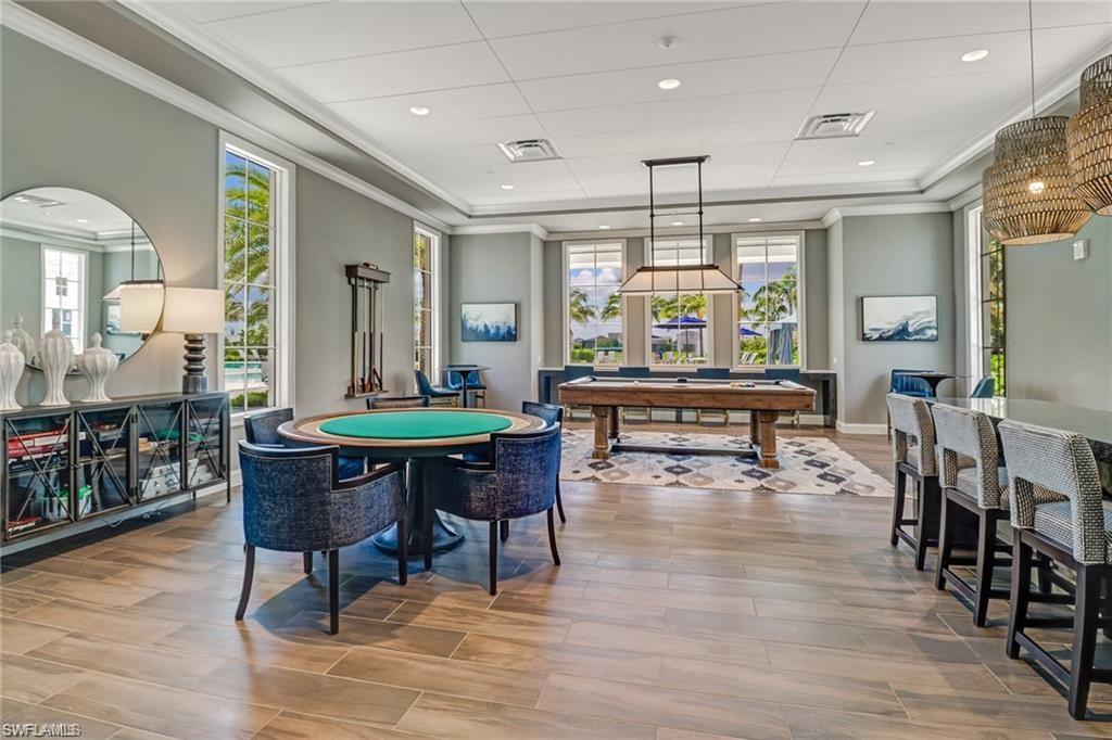Game room featuring visible vents, billiards, and ornamental molding