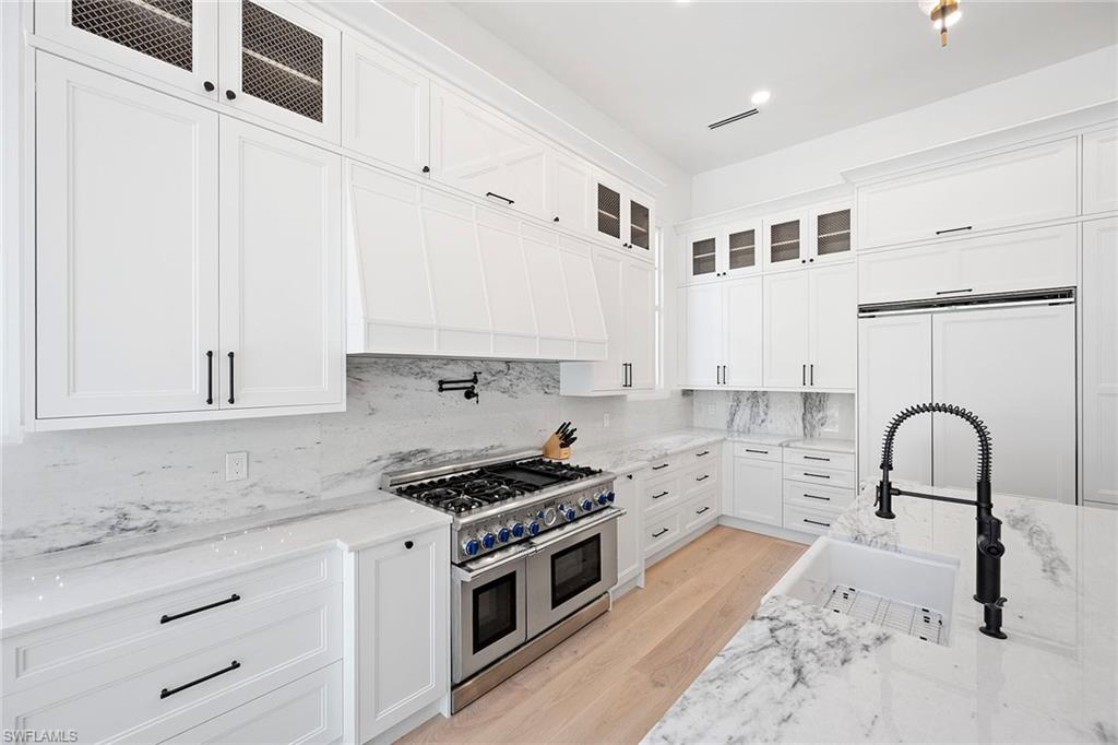 Gas stove with a pot-filler faucet