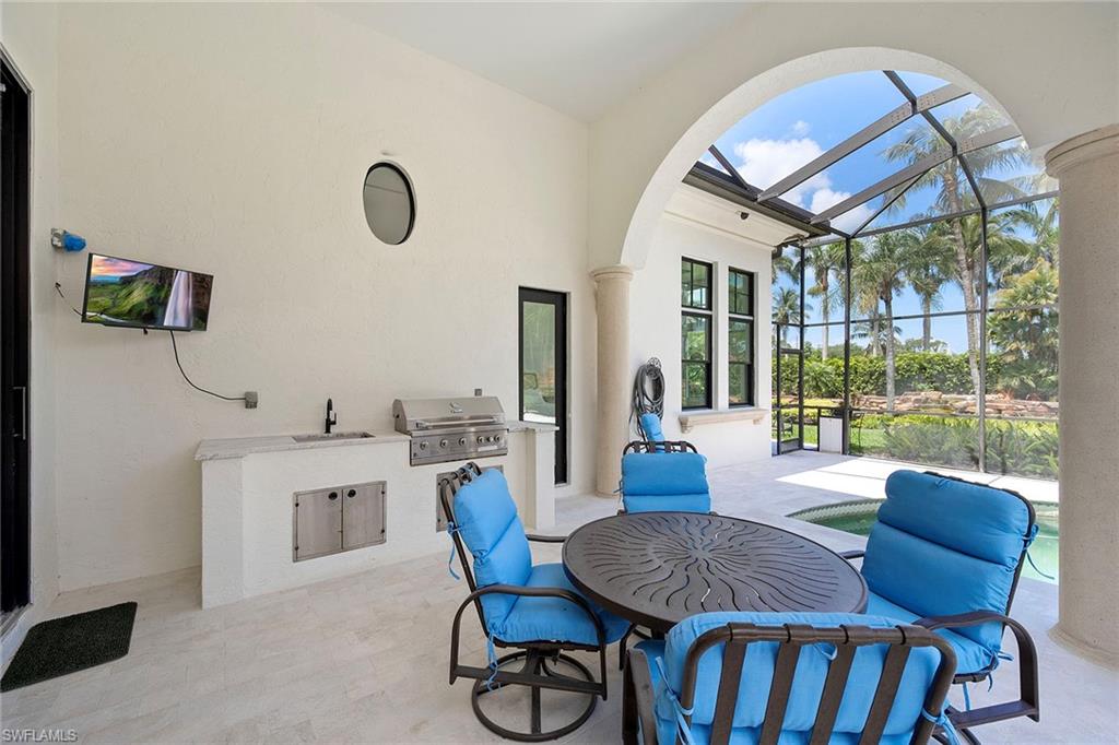 Covered outdoor kitchen/grill area