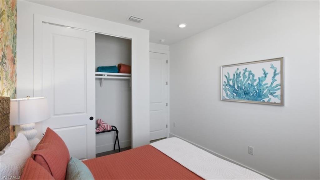 Bedroom with a closet and recessed lighting - Virtually Edited