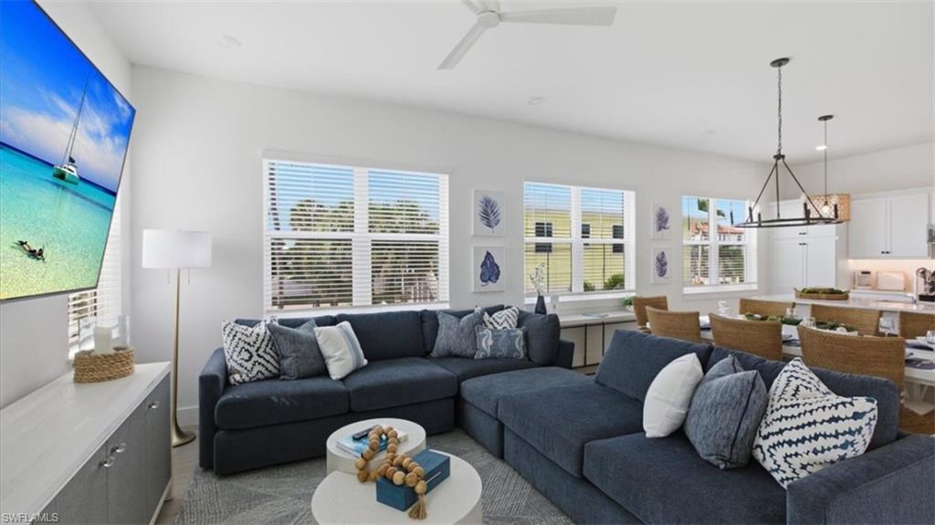 Living area with a ceiling fan - Virtually Edited