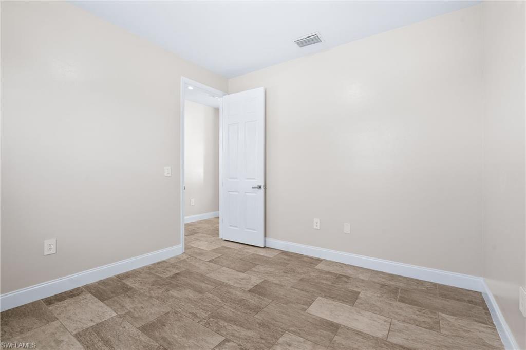 Spare room with baseboards