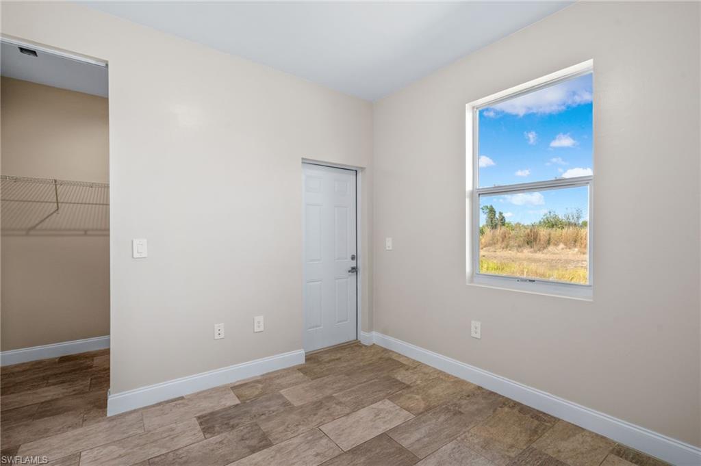Spare room with baseboards